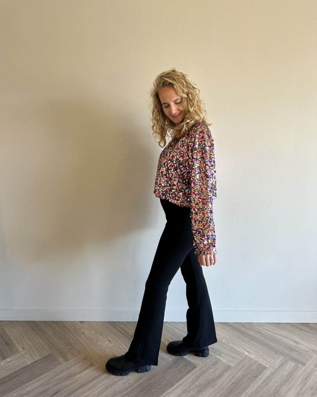 Topje met pailletten en lange mauwen